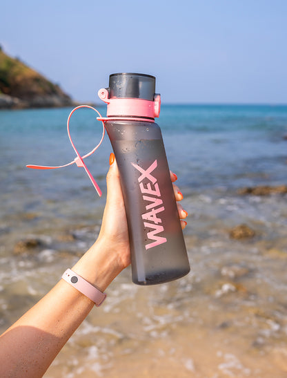 A 600ml water bottle featuring a pink and black design, labeled "wavex," ideal for hydration on the go